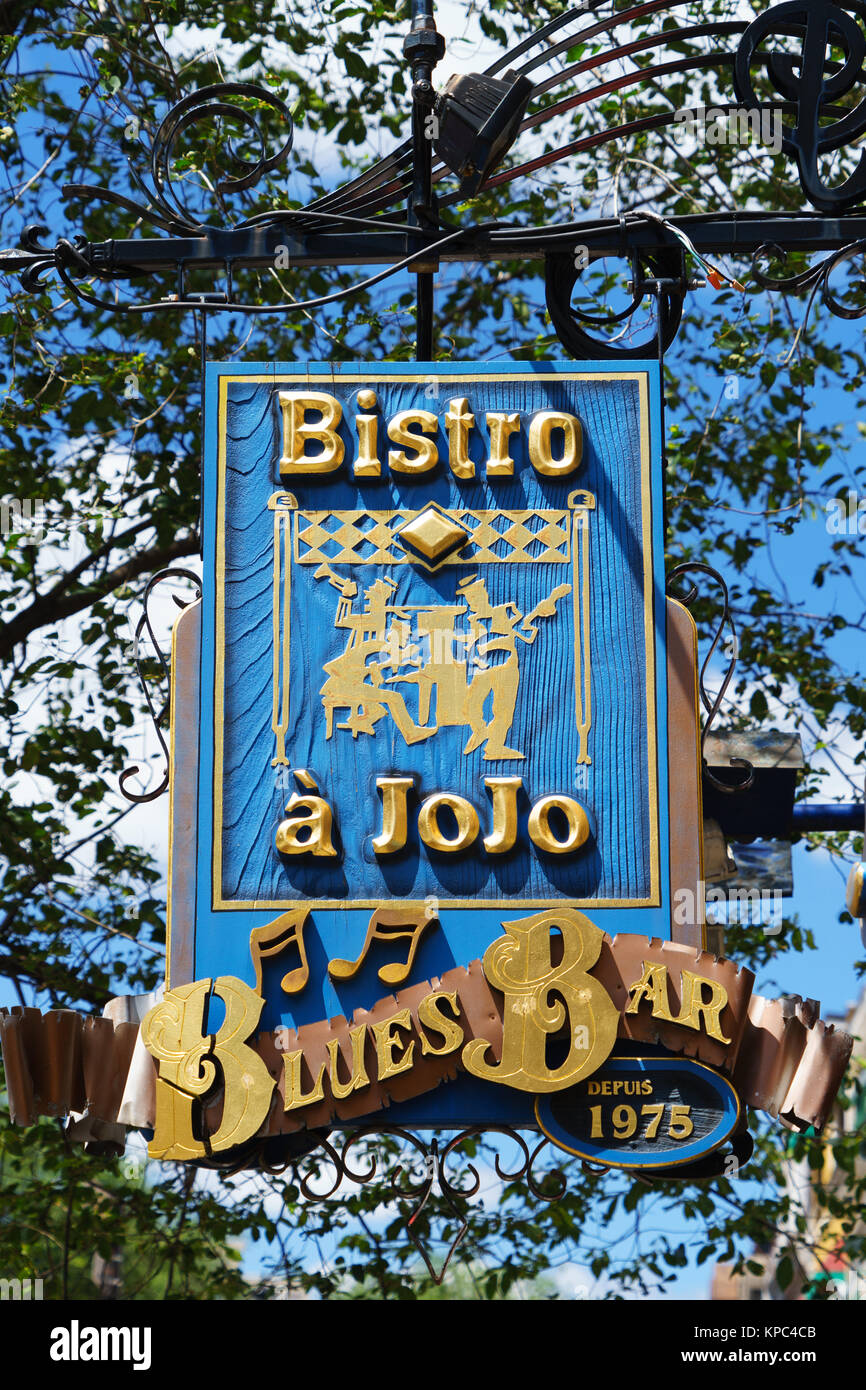 Hanging sign for Bistro à Jojo, a famous blues bar on St-Denis street, Montreal, province of Quebec, Canada. Stock Photo