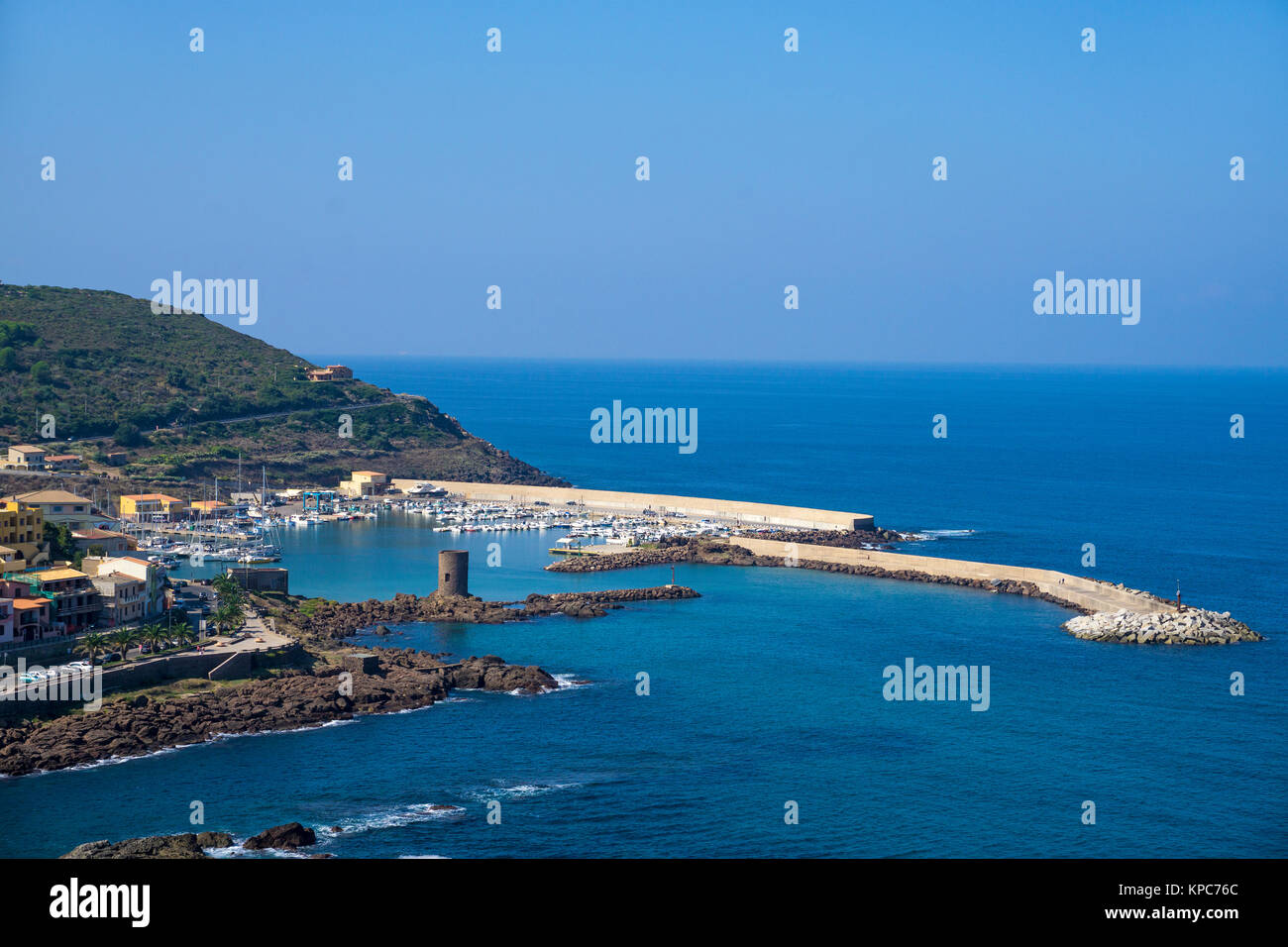 View on harbour entrance with watchtower and Marina,of Castelsardo, Sardinia, Italy, Mediterranean sea, Europe Stock Photo