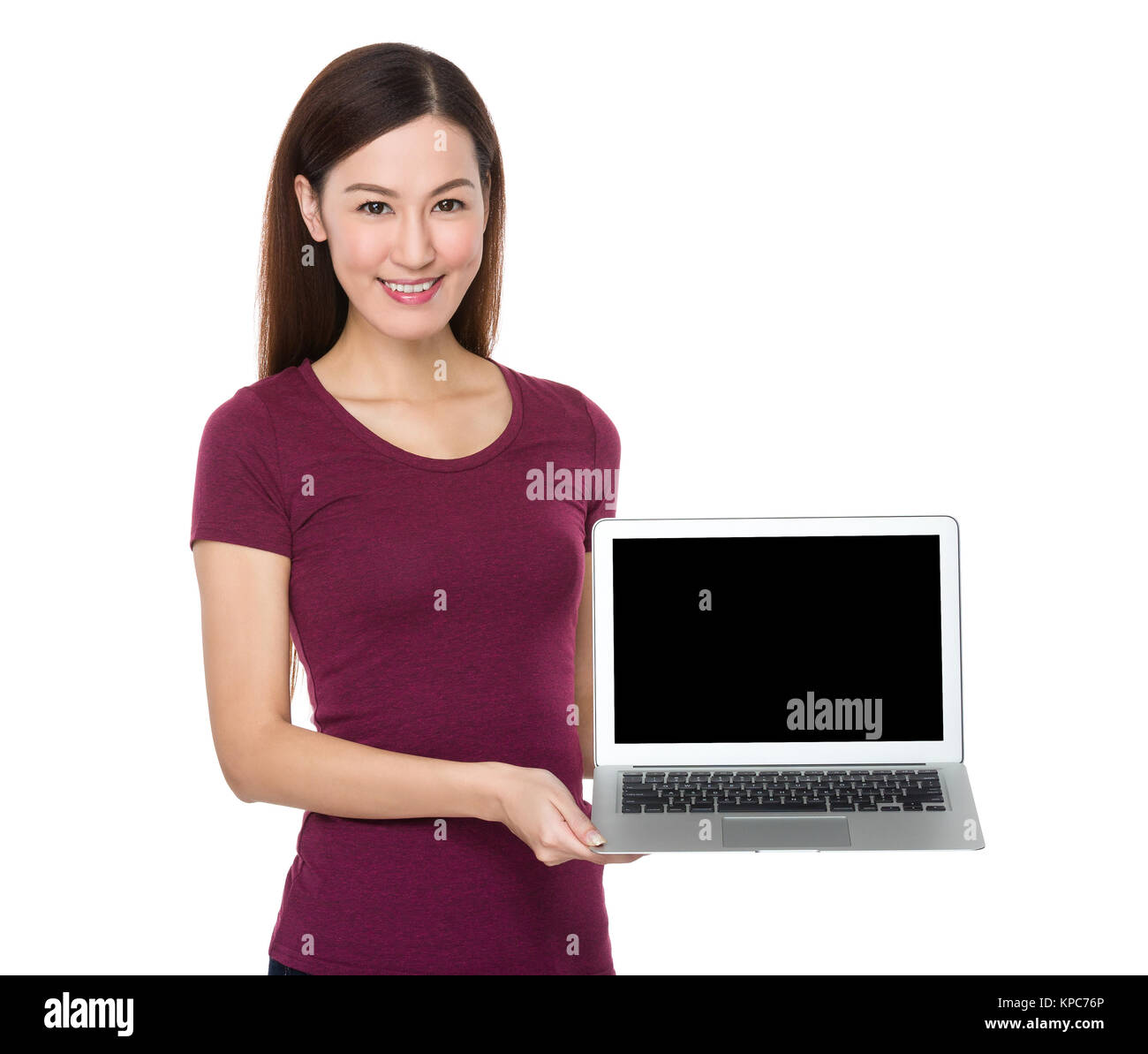 Asian Woman show with the blank screen of laptop computer Stock Photo