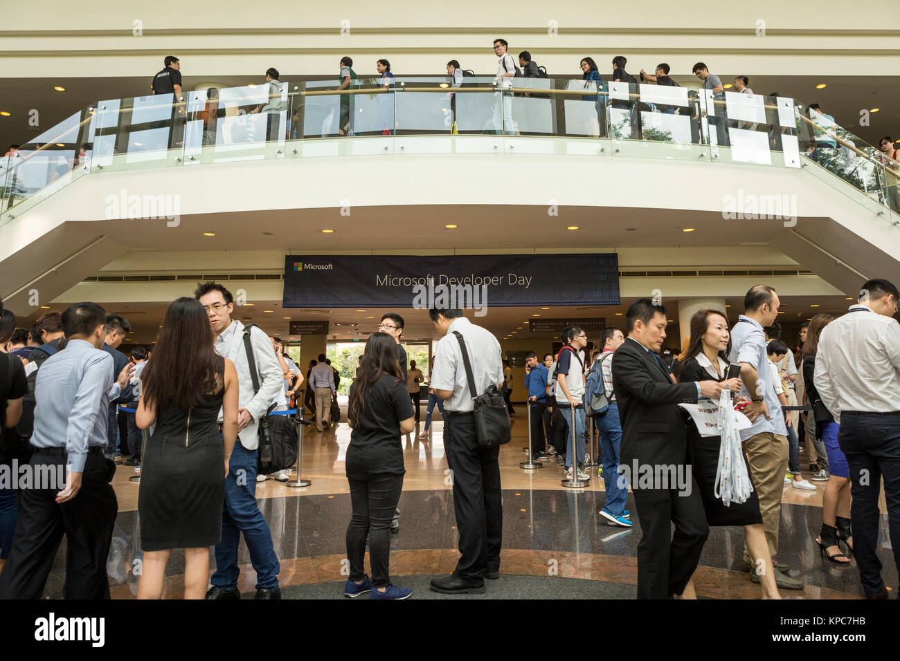 Attendees register for the Microsoft Developer Day in Singapore, May 27, 2016. Stock Photo