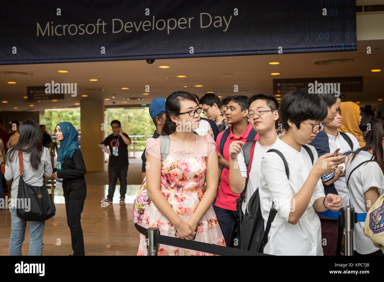 Attendees register for the Microsoft Developer Day in Singapore, May 27, 2016. Stock Photo