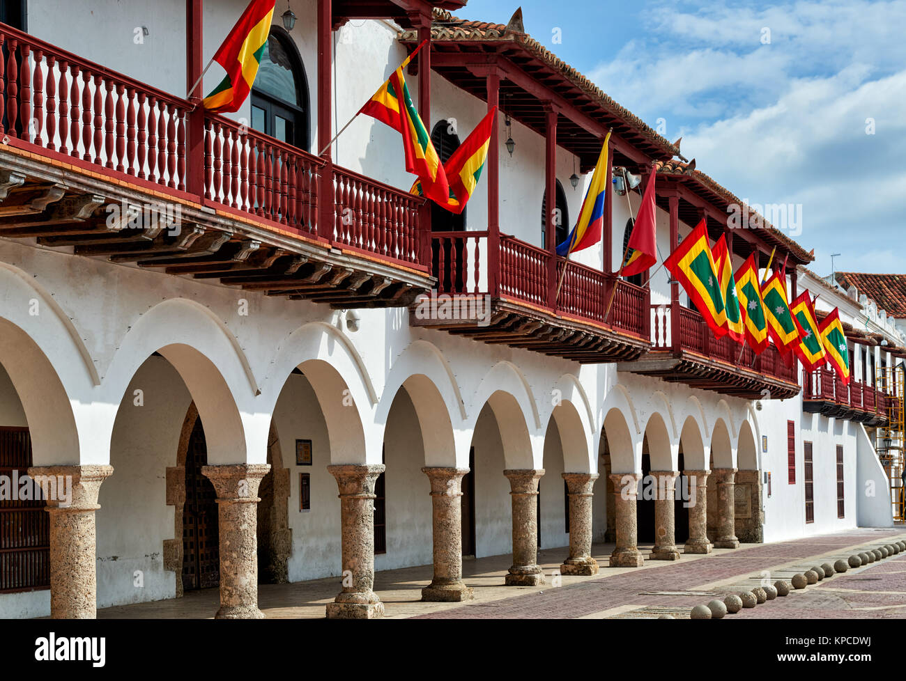 flags of Cartagena at historical facade of town hall 'Alcaldia Mayor', Cartagena de Indias, Colombia, South America Stock Photo