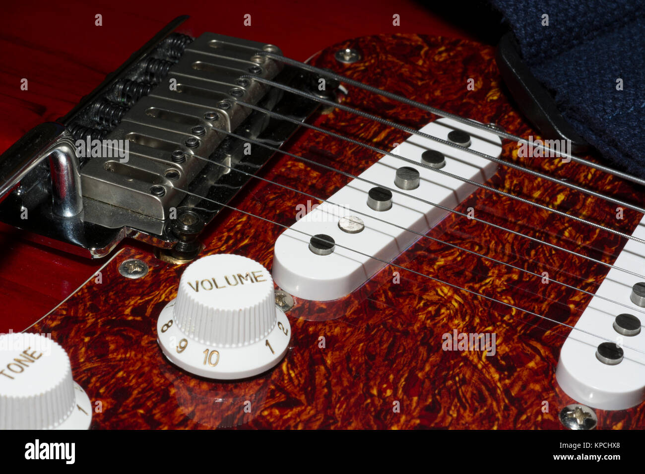 Electric guitar frets, strings & pickup Stock Photo Alamy
