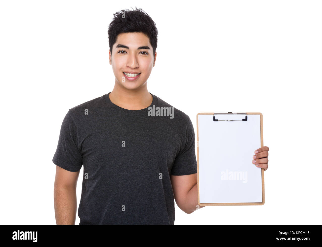 Asian young man show with clipboard Stock Photo - Alamy