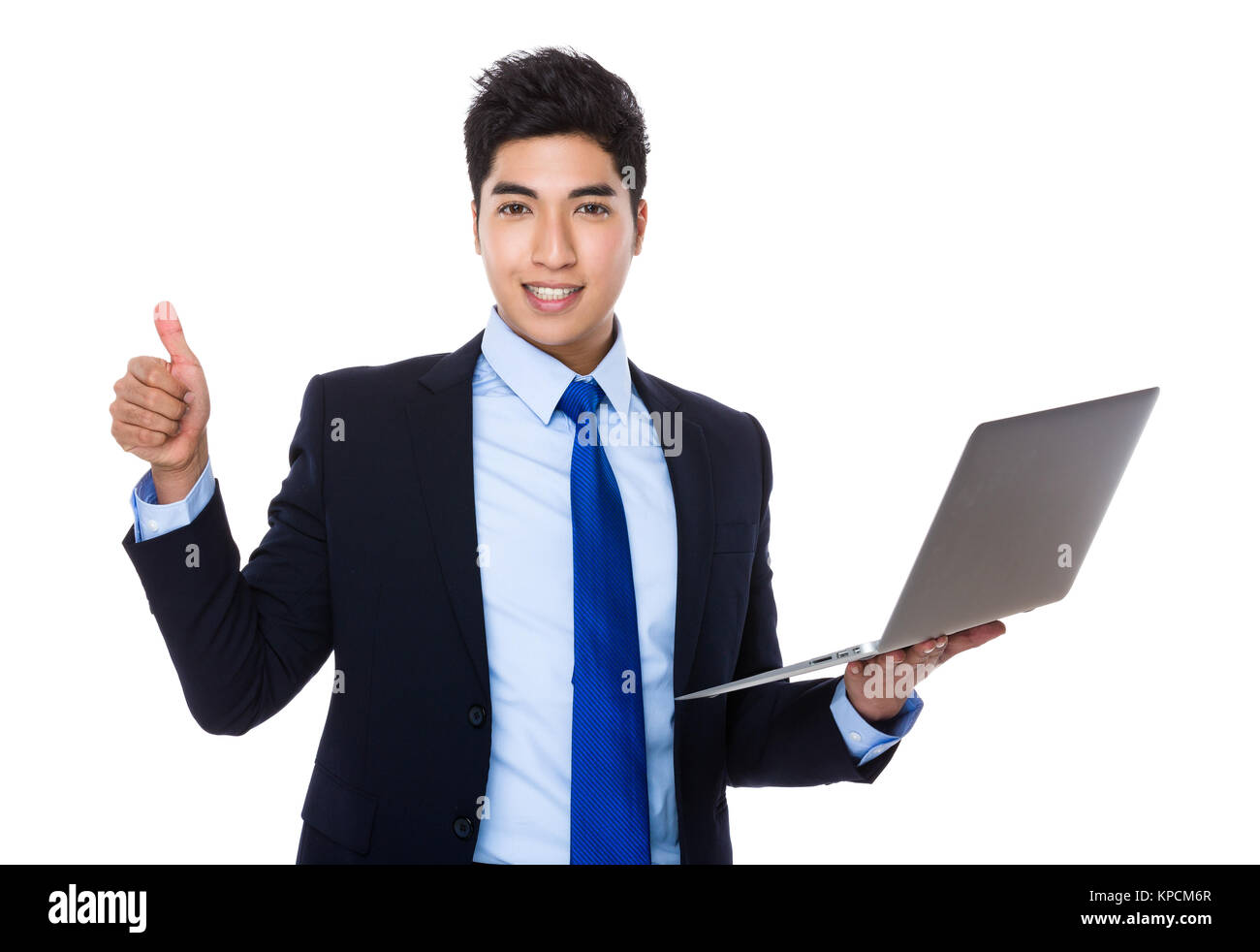 Businessman hold with laptop computer and thumb up Stock Photo - Alamy