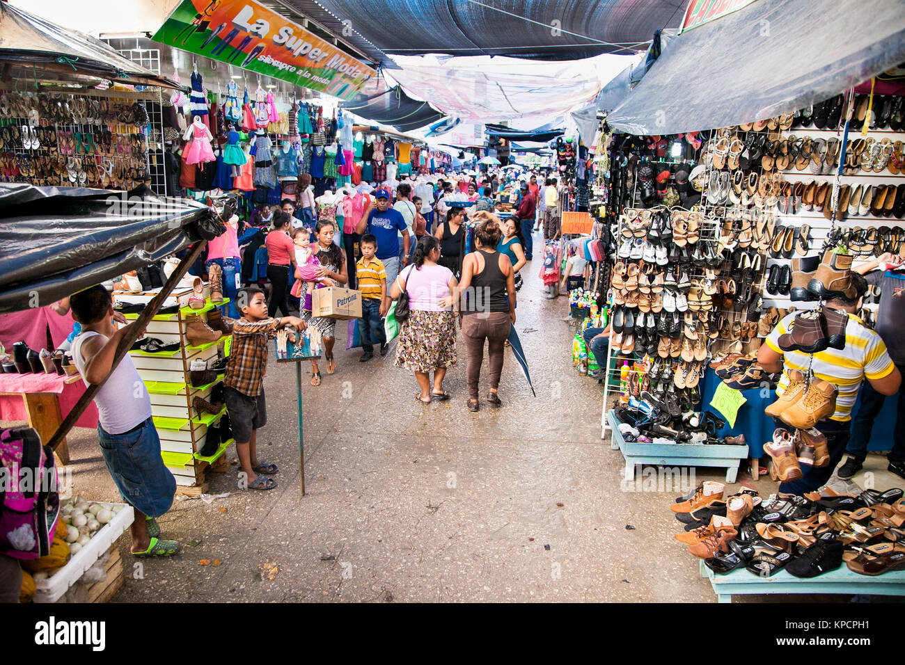 FLORES, GUATEMALA-DEC 22, 2015:  Local people selling goods in Flores market on Dec 22, 2015. Guatemala. Stock Photo