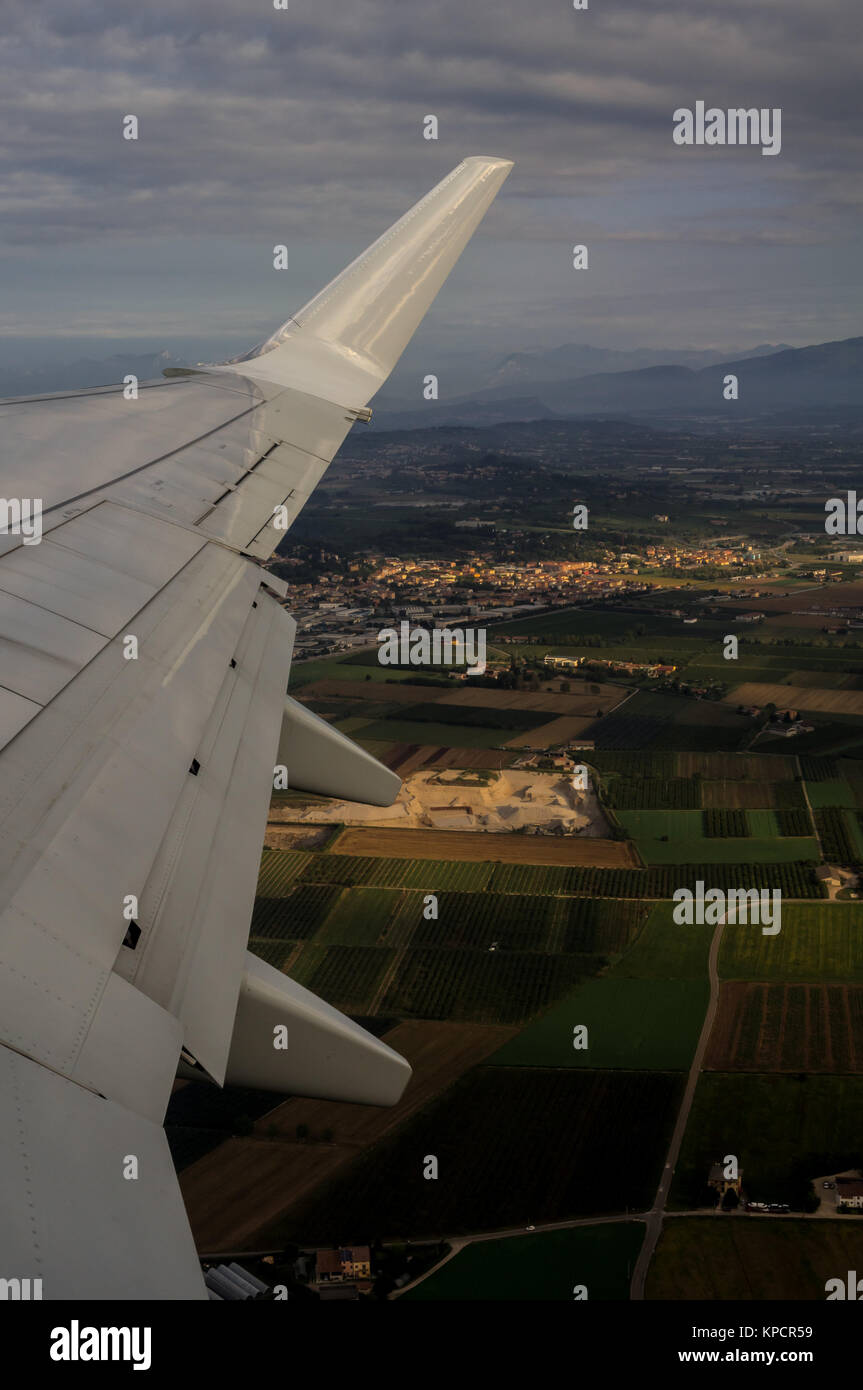 Taking off Aerial View on Verona from Aircraft Porthole Stock Photo
