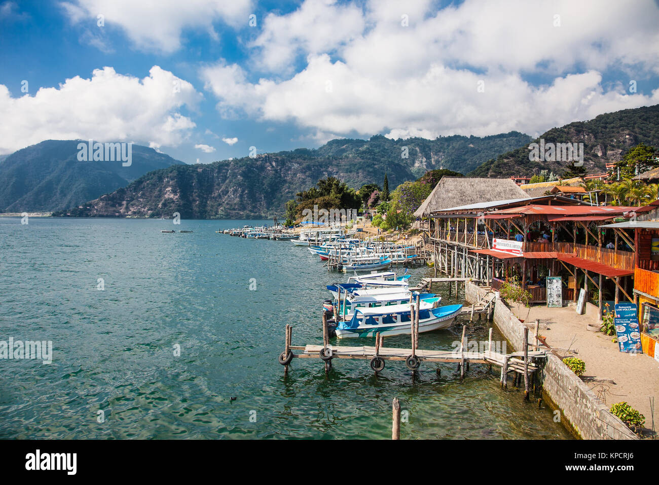 PANAJACHEL, GUATEMALA-DEC 24, 2015: Boats at the dock of Lake Atitlan in Panajachel on Dec 24, 2015, Guatemala. Central America. Stock Photo