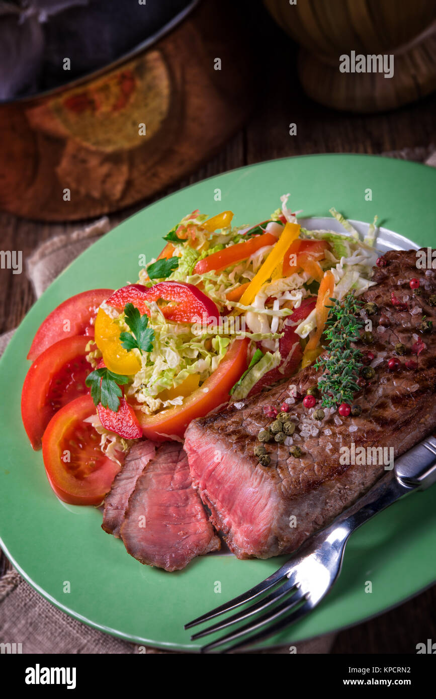 grilled steak with salad Stock Photo - Alamy