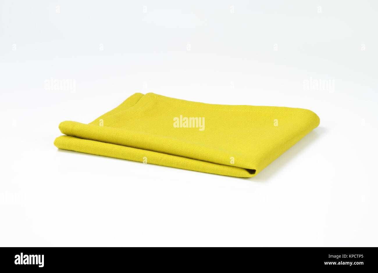 Green folded napkin Stock Photo Alamy