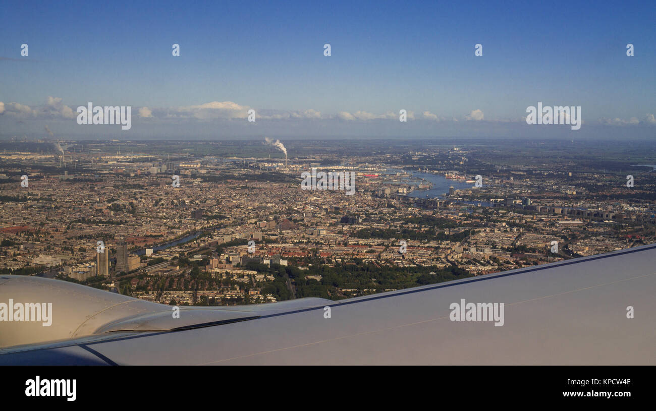 European City Amsterdam Aerial View from Jet Aircraft Porthole Stock Photo