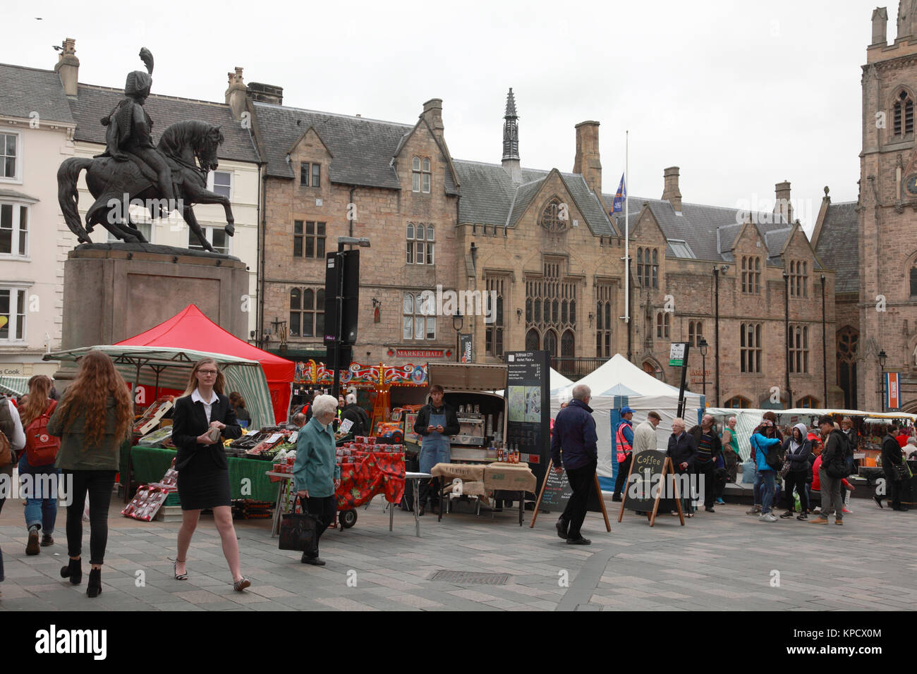 The outdoor Saturday market in Market Place, Durham, busy with shoppers Stock Photo