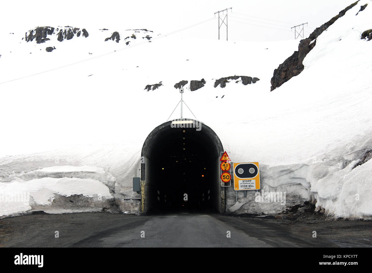 road and tunnel in mountain with snow and ice Stock Photo Alamy
