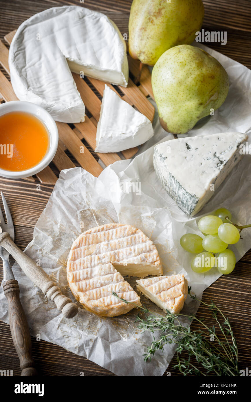 Moldy cheese with pears and grape Stock Photo Alamy