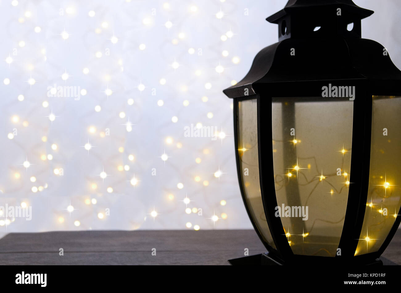 Christmas lantern with fairy lights and glow Stock Photo