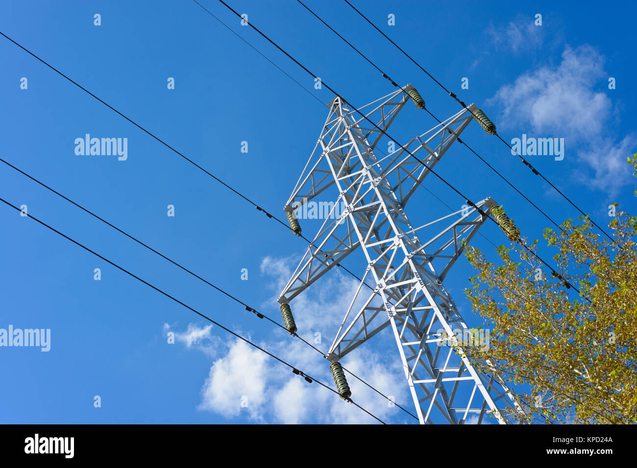 structure for holding wires - ground wire overhead power lines and fiber-optic communication line at a predetermined distance from the ground and from Stock Photo