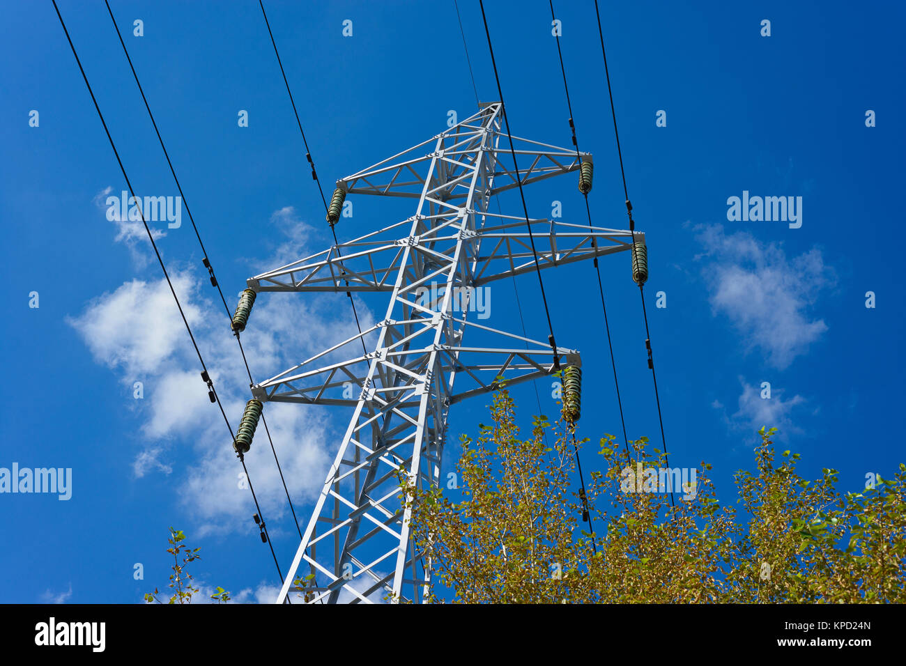 structure for holding wires - ground wire overhead power lines and fiber-optic communication line at a predetermined distance from the ground and from Stock Photo