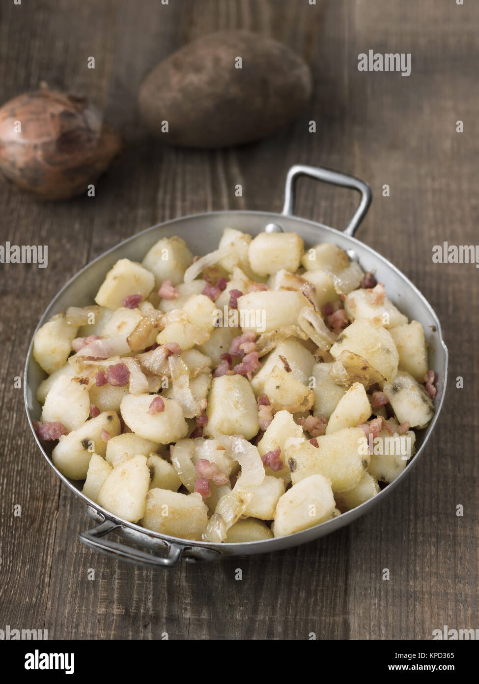 rustic german pan fried potato bratkartoffeln Stock Photo