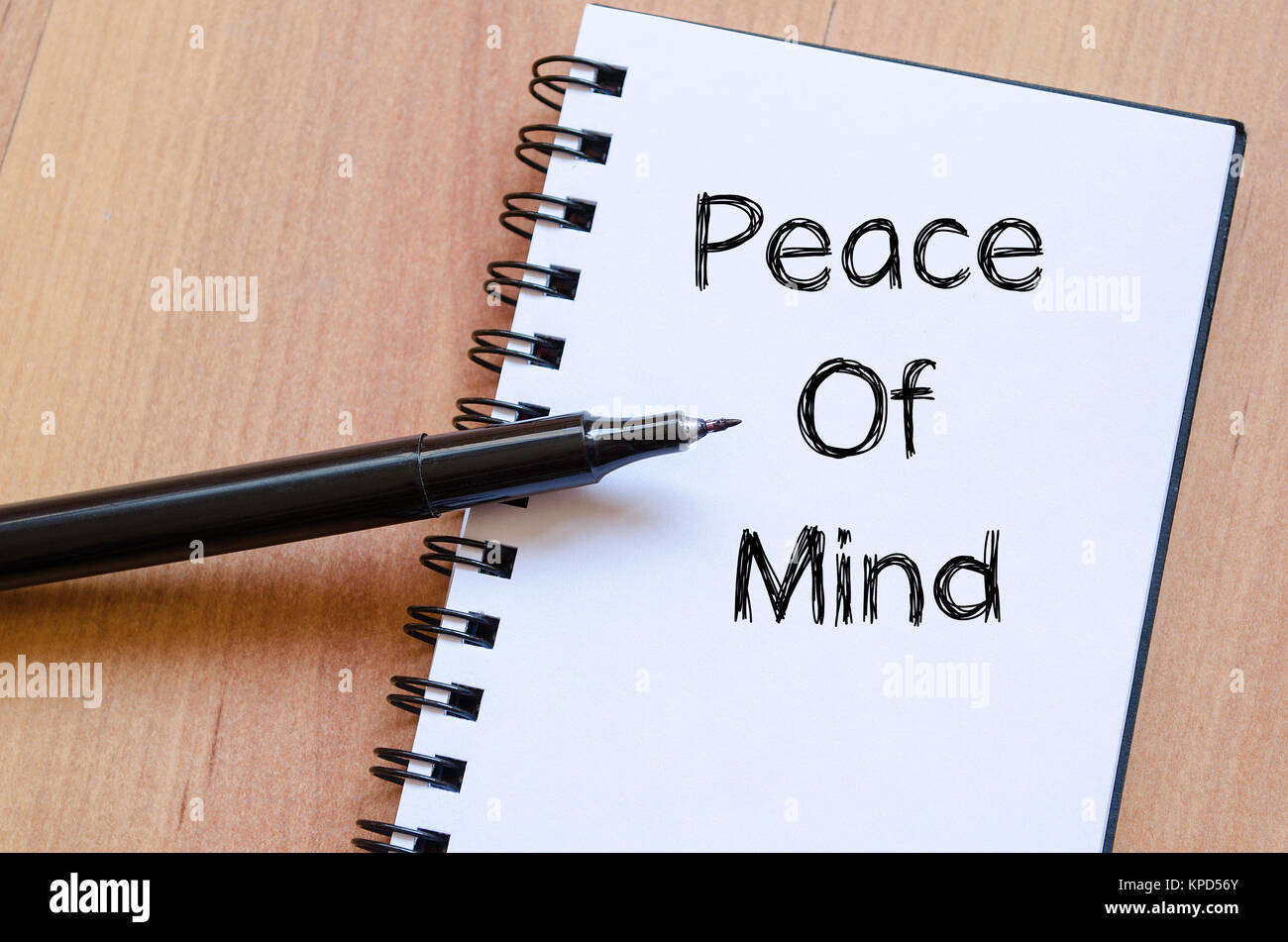 Peace of mind write on notebook Stock Photo