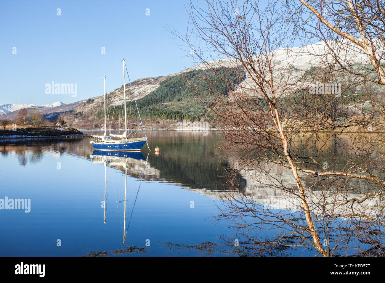 Boat or yacht anchored in Loch Leven, Scotland UK Stock Photo