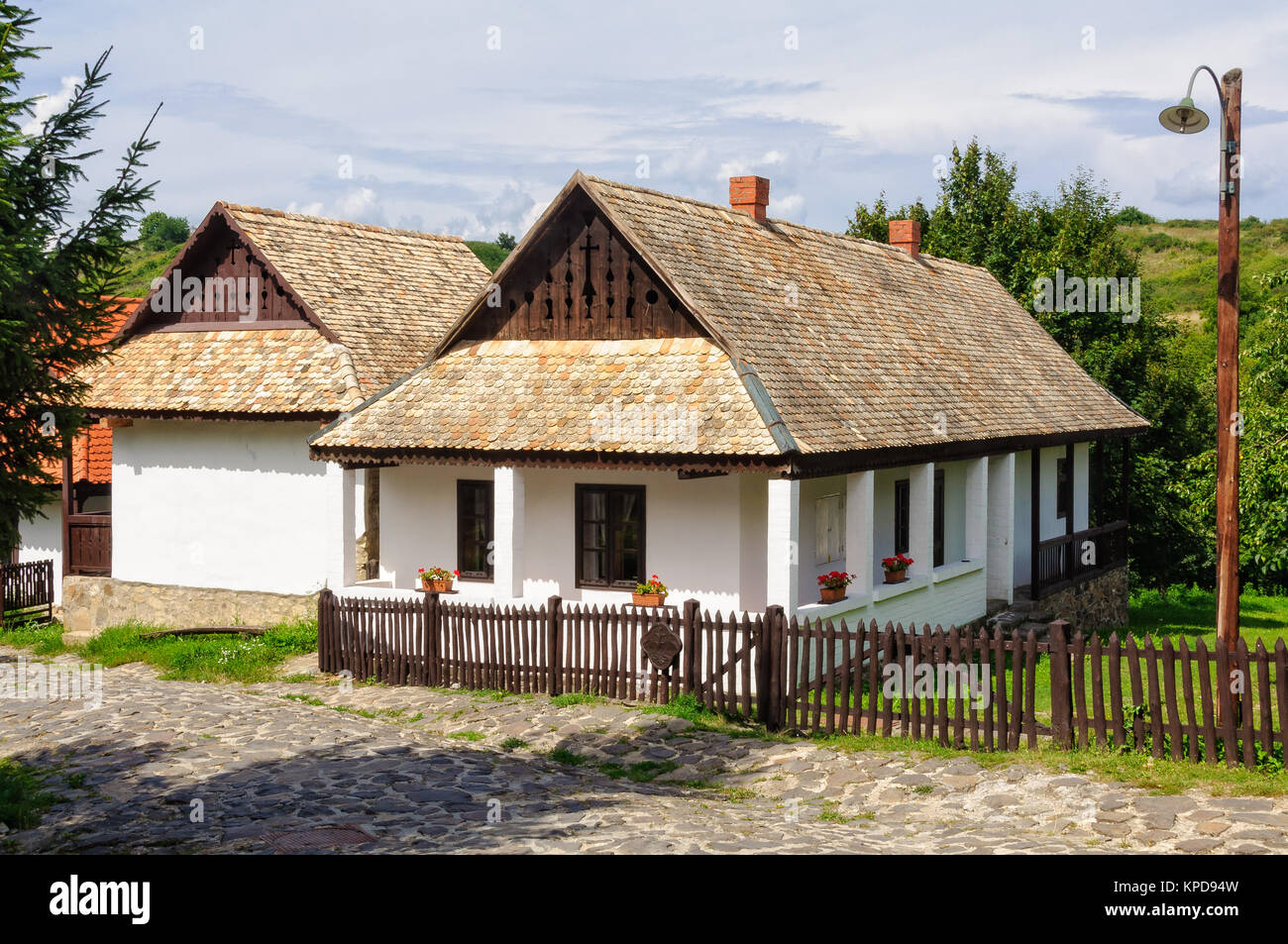 A traditional Paloc farmhouse in the UNESCO World Heritage village - Holloko, Hungary Stock Photo