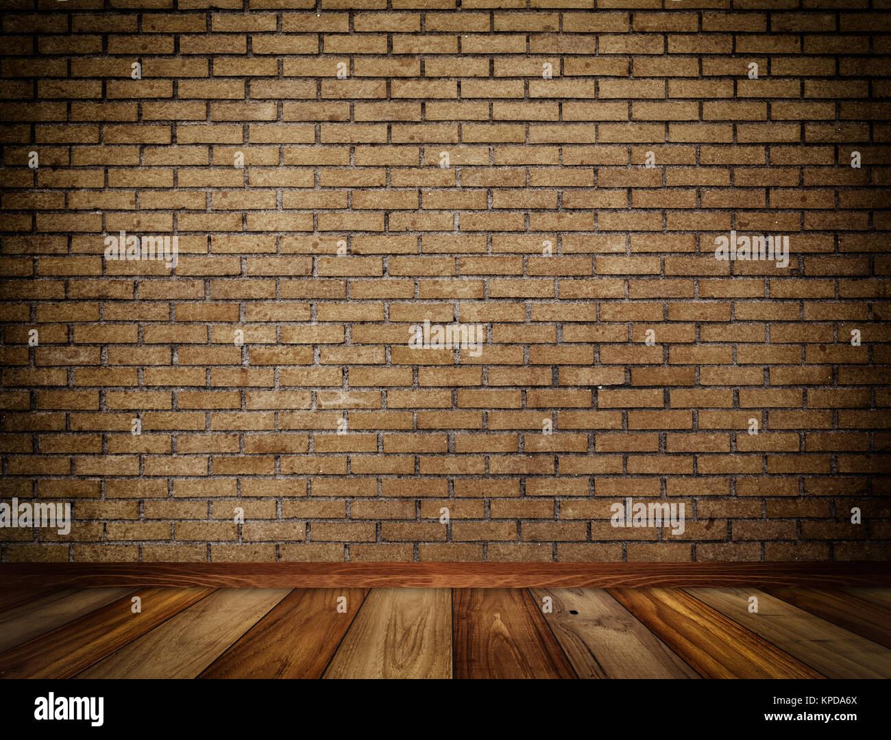 Aging brick wall and wooden floor. Background for the design Stock