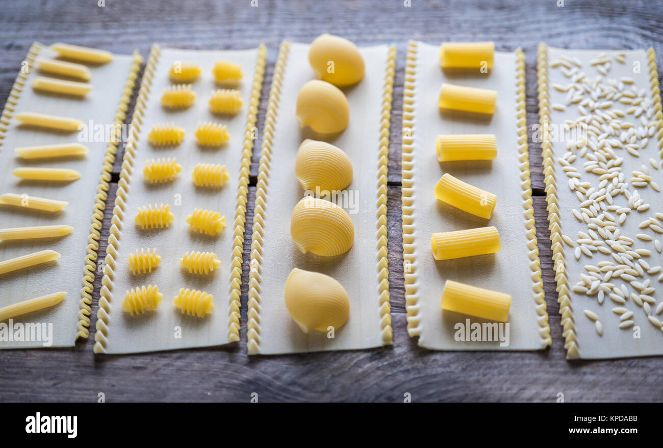 Various types of pasta on lasagne sheets Stock Photo Alamy