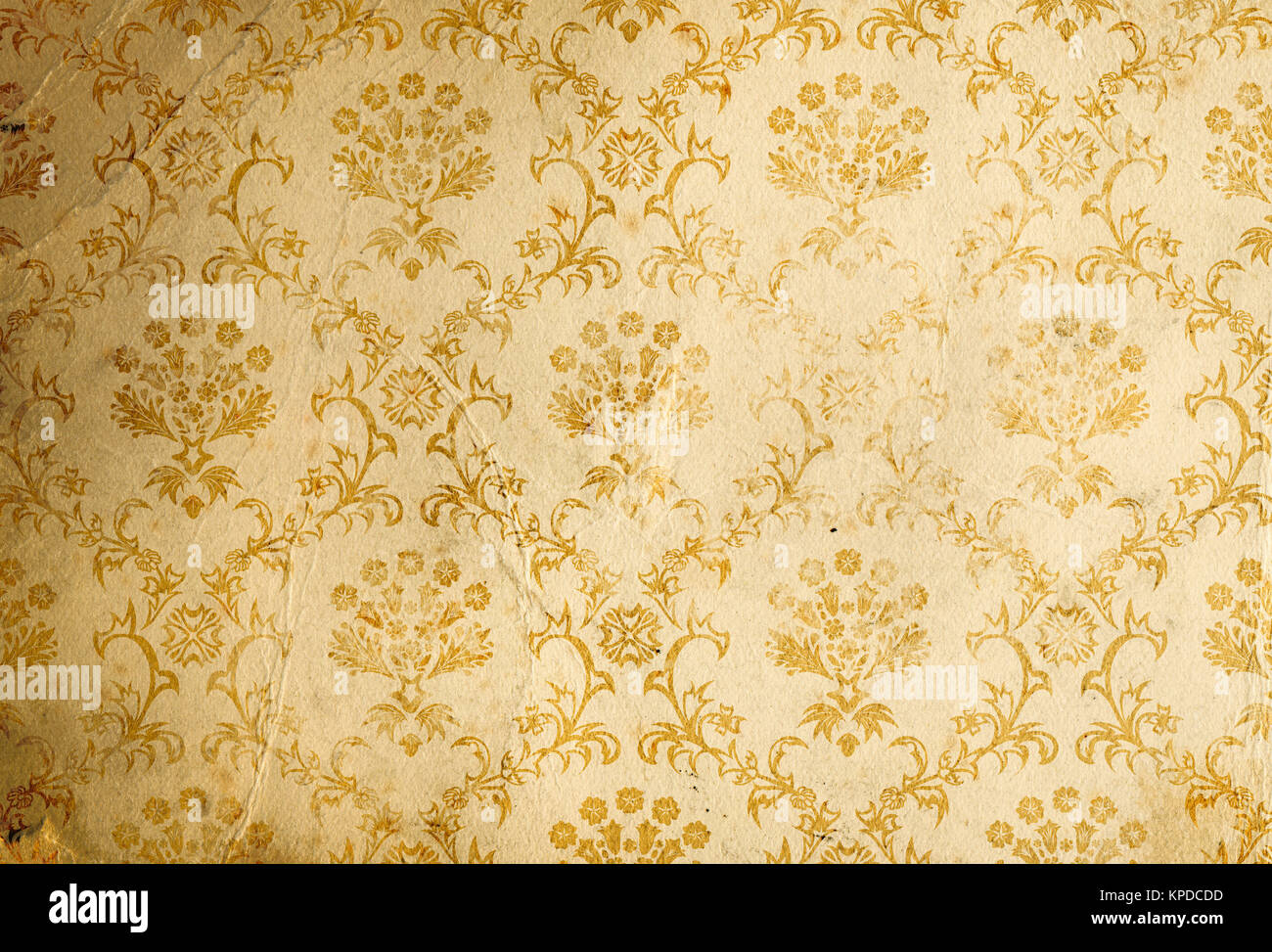 Old dirty and crumpled paper background with oldfashioned floral