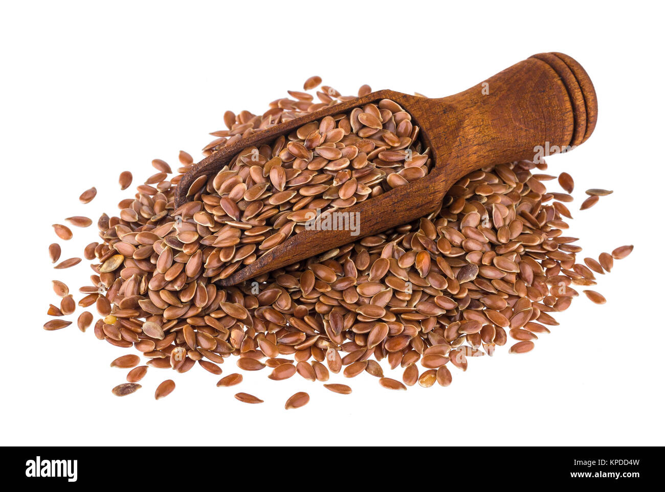 Flax seeds in wooden scoop isolated on white background close-up Stock Photo