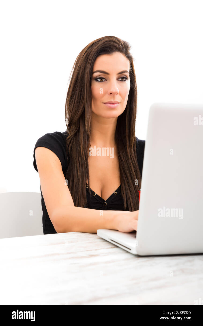 A young beautiful woman using a Laptop computer at home Stock Photo - Alamy