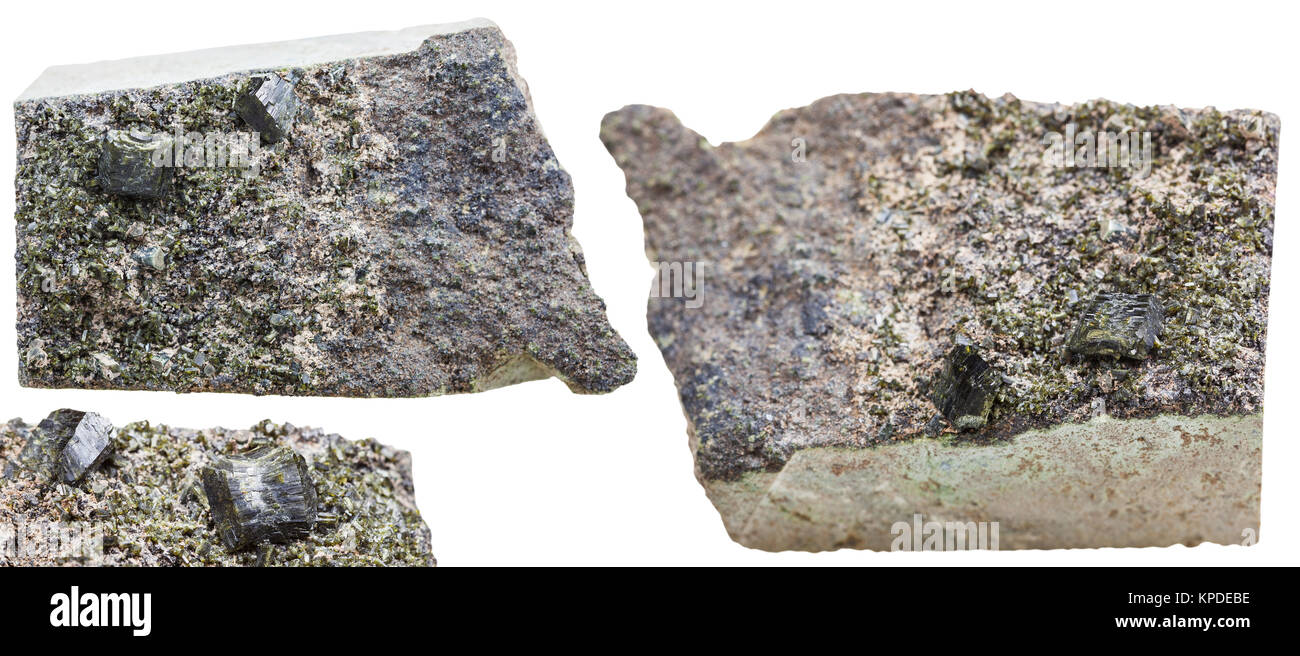 rock pieces with green epidote crystals isolated Stock Photo