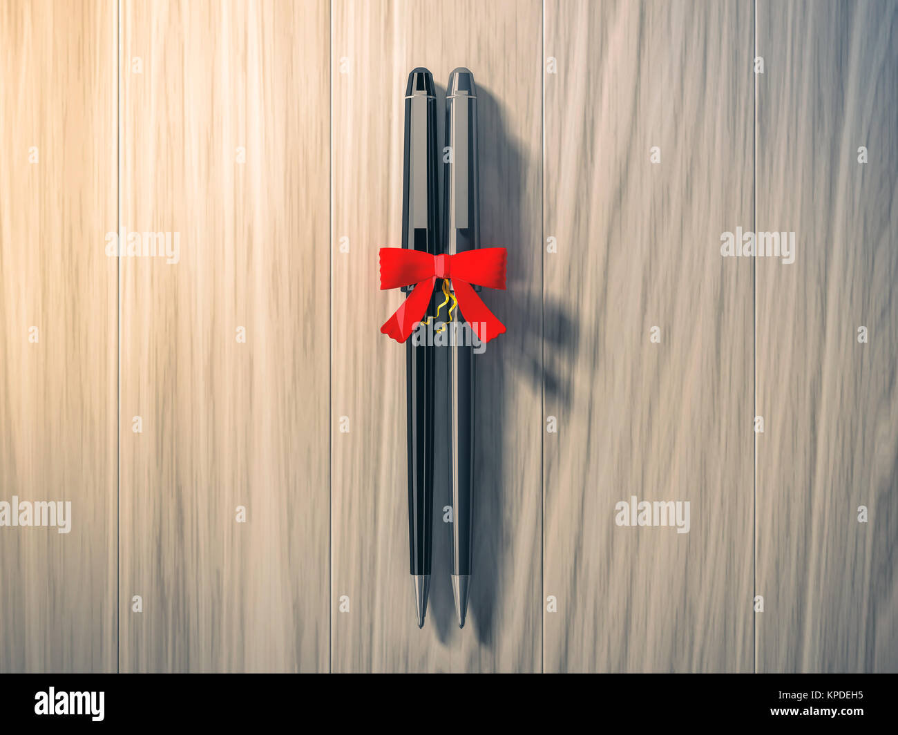 Pen wrapped with color ribbon Stock Photo Alamy