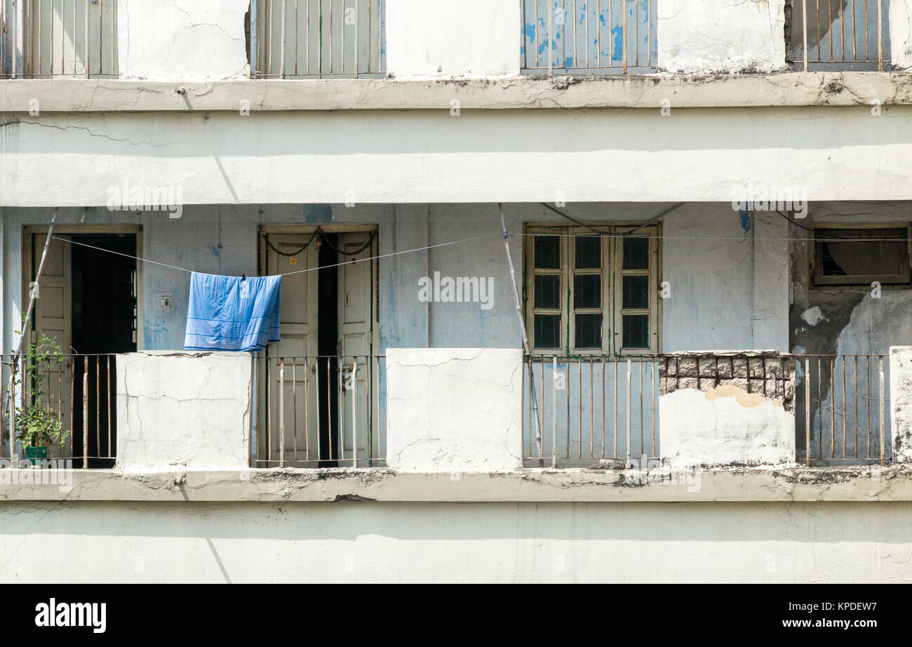Destitute families still live in near derelict appartment blocks in Calcutta ( Kolkata) India. Stock Photo