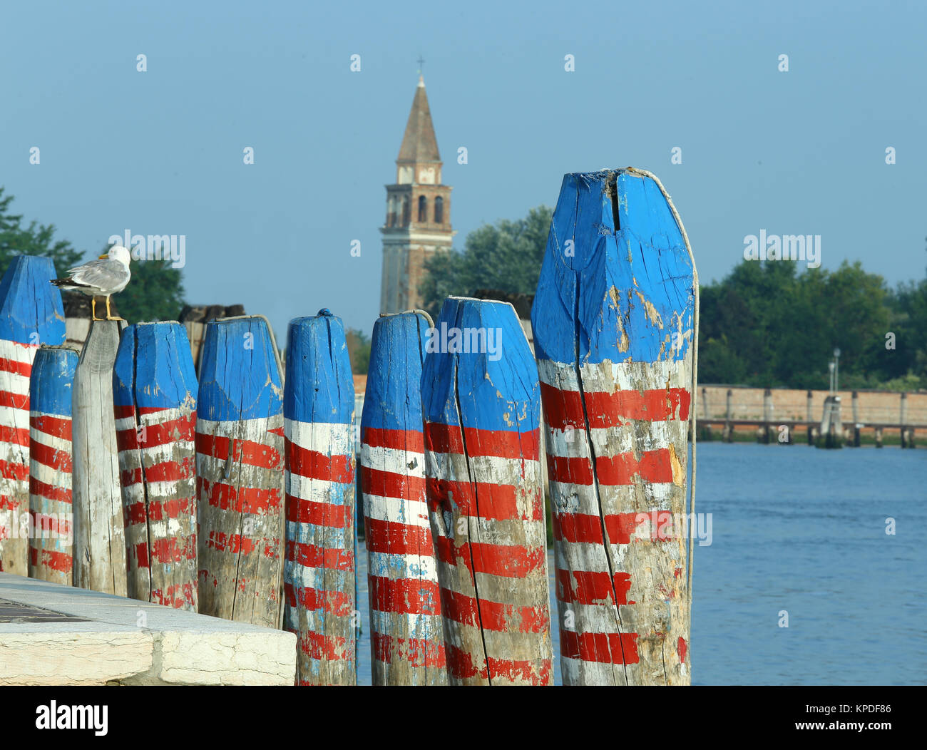 poles to moor the boat called bricole in italian language Stock Photo