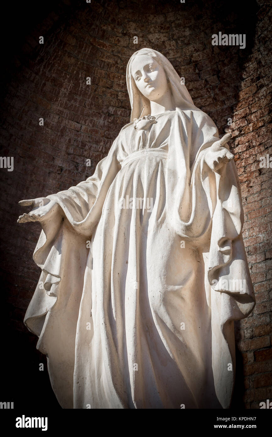 White stone statue of saint Mary Stock Photo