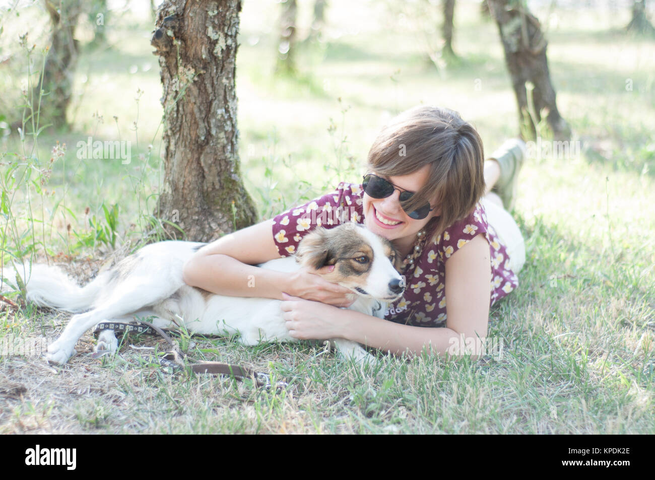 girl and pet dog Stock Photo