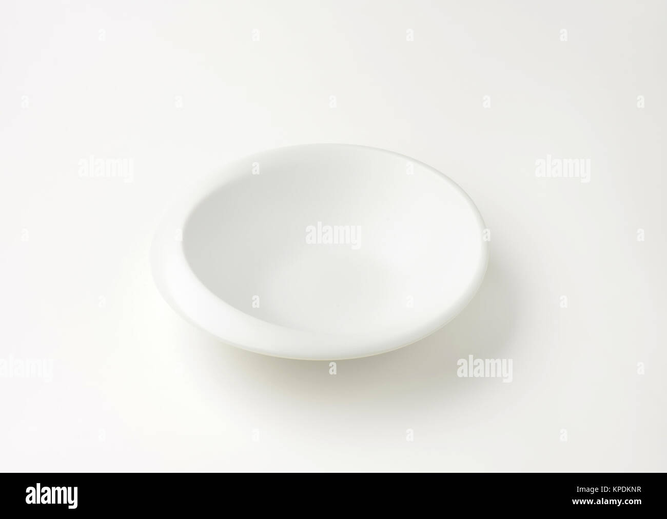 white bowl with irregular rim Stock Photo - Alamy