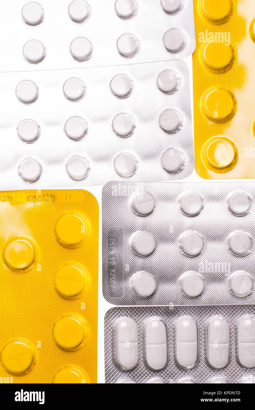 Blisters with pills on a white background for the treatment of diseases Stock Photo