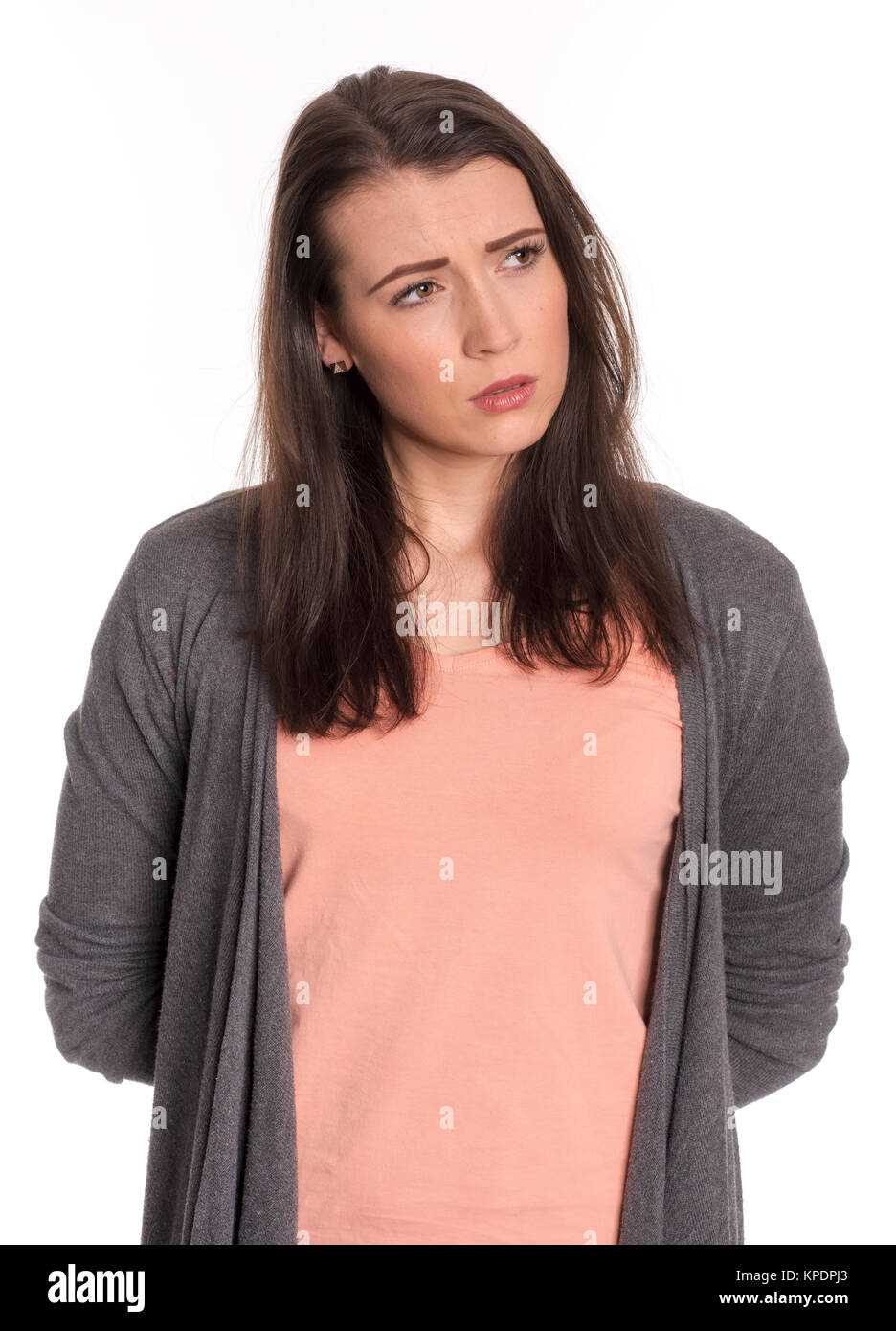 young woman in portrait looks contemplative Stock Photo