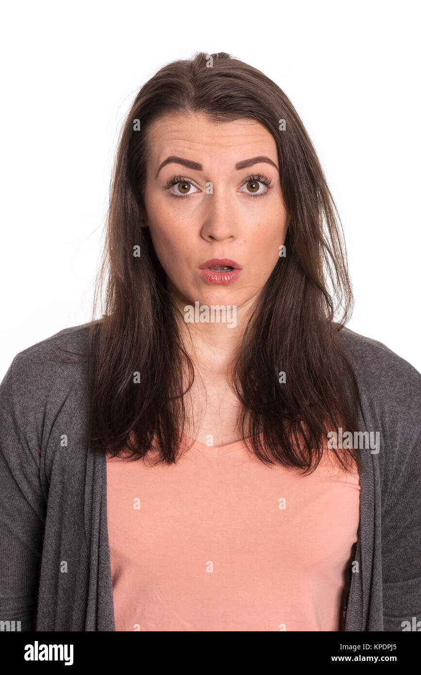 young woman in portrait looks astonished Stock Photo