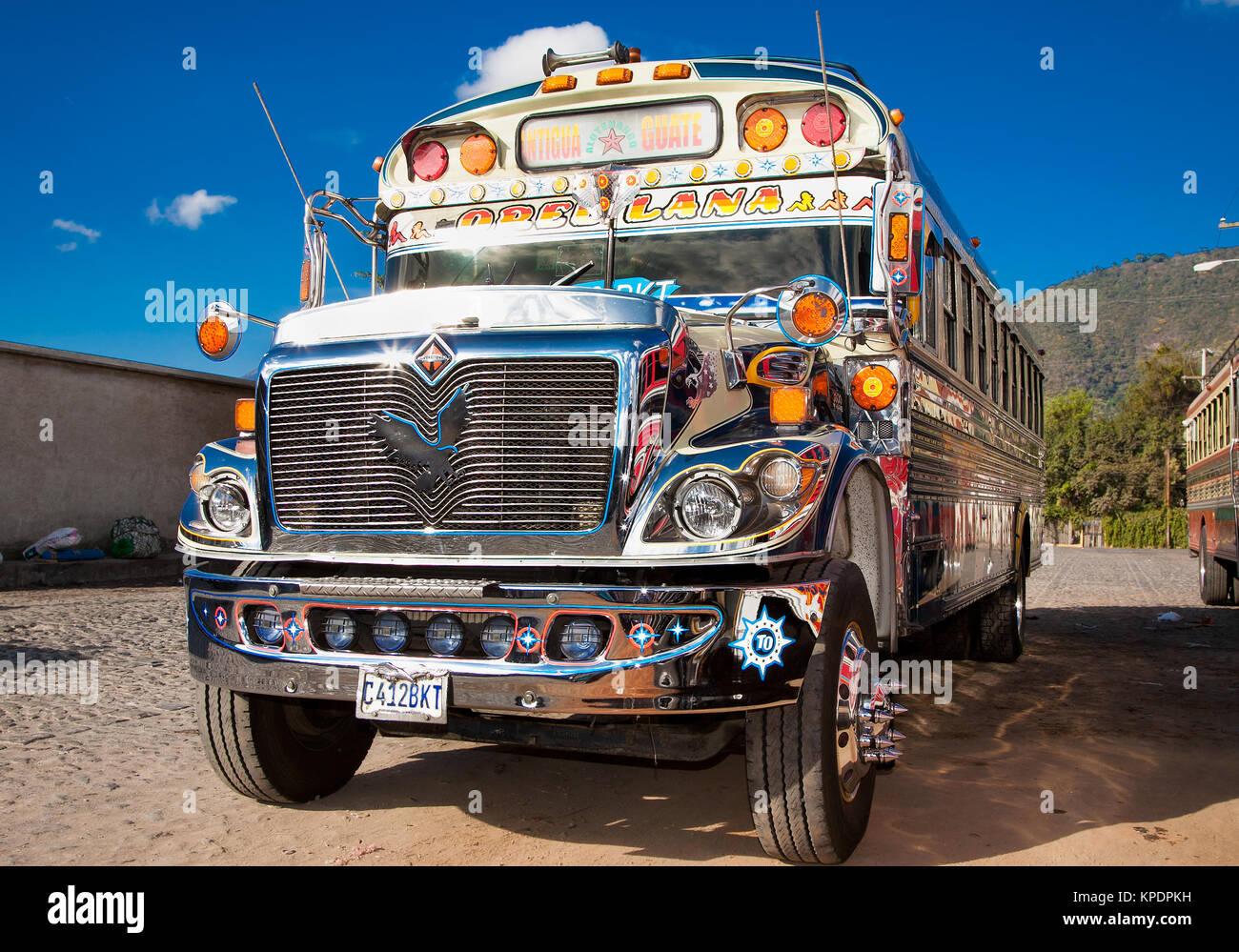 ANTIGUA,GUATEMALA -DEC 25,2015:Typical guatemalan chicken bus in Antigua, Guatemala on Dec 25, 2015.Chicken bus It's a name for colorful, modified and Stock Photo