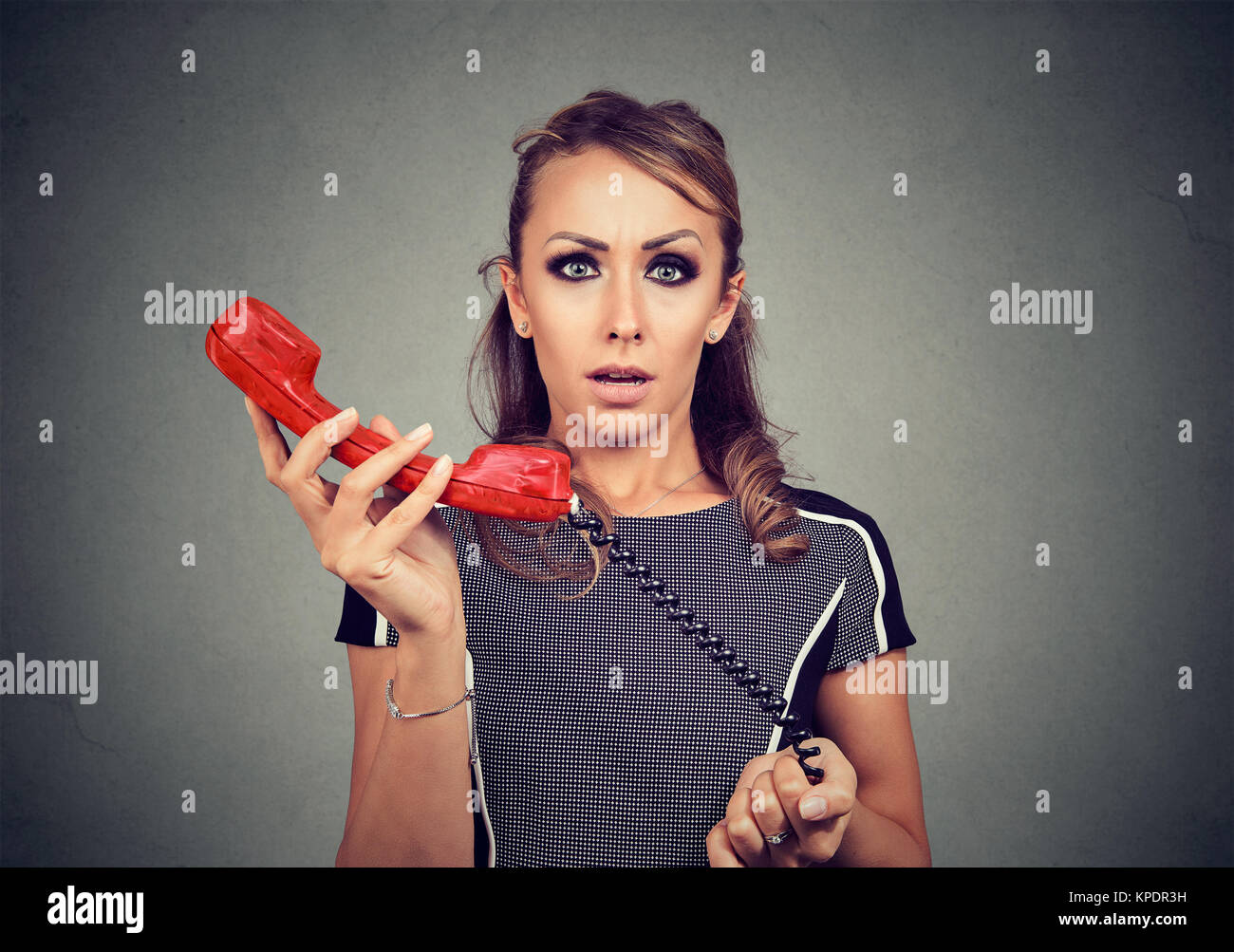 Old fashioned telephone receiver woman hi-res stock photography and