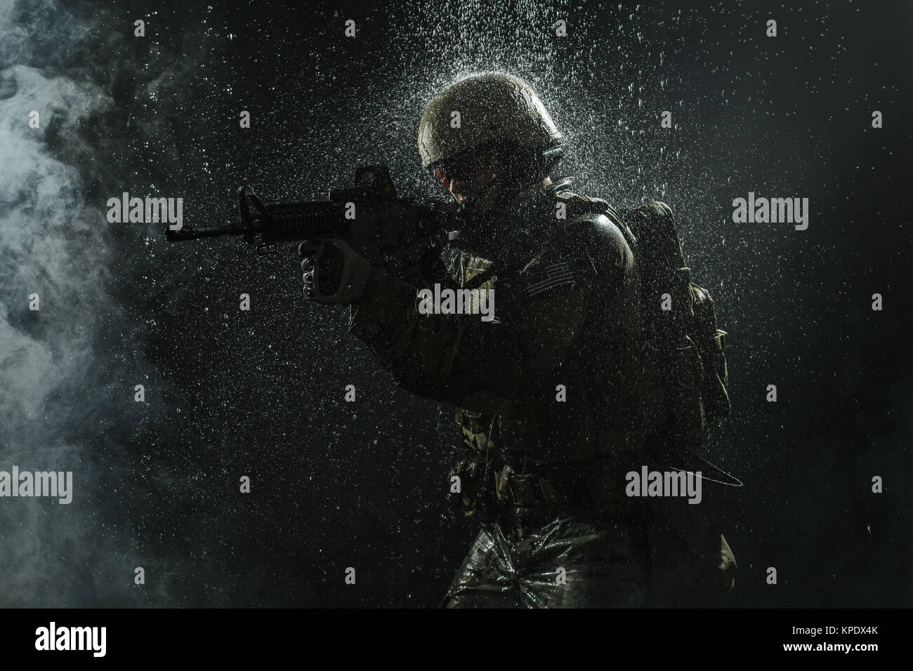 US Army soldier in the rain Stock Photo - Alamy