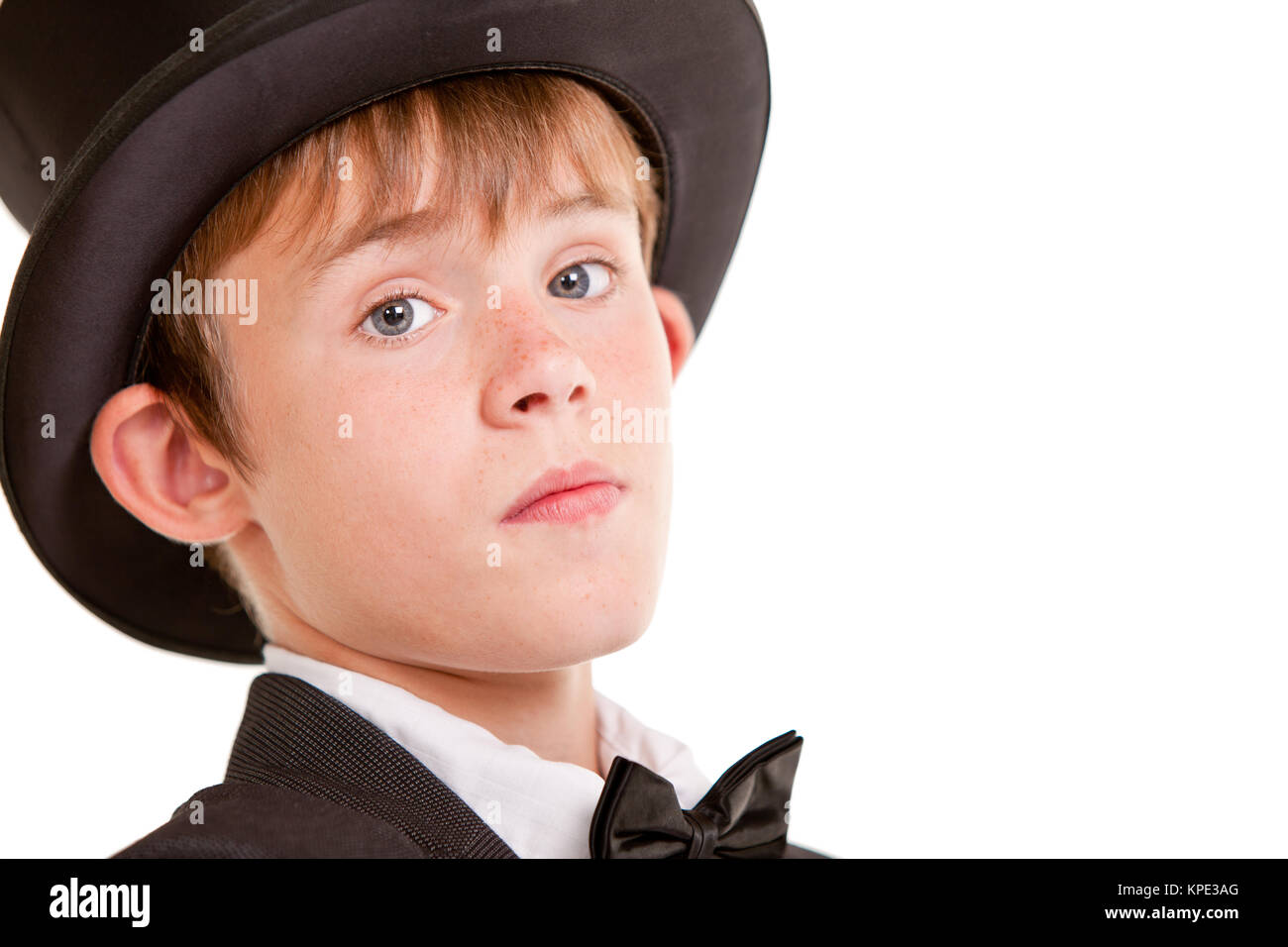 Confident Boy in Formal Wear with Top Hat Stock Photo