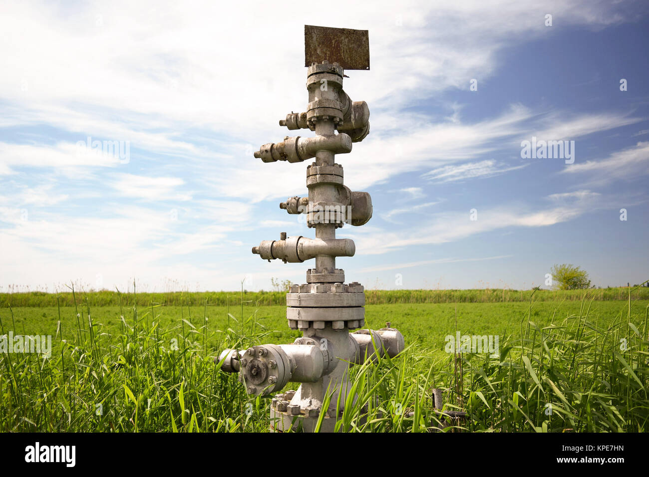 Canned oil well against the sky and field Stock Photo Alamy