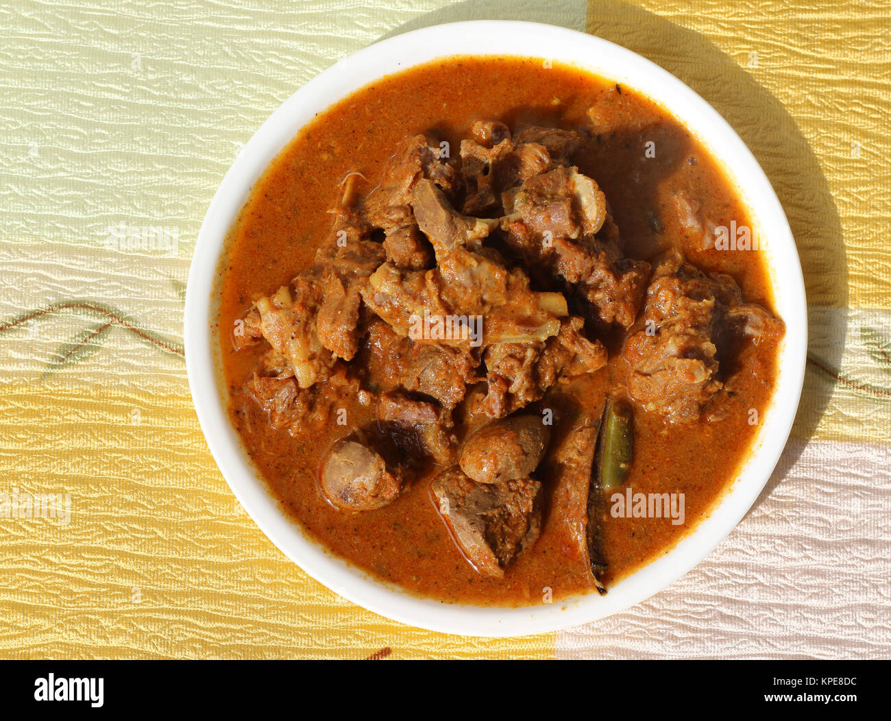 Mutton curry with thick spicy gravy Stock Photo Alamy