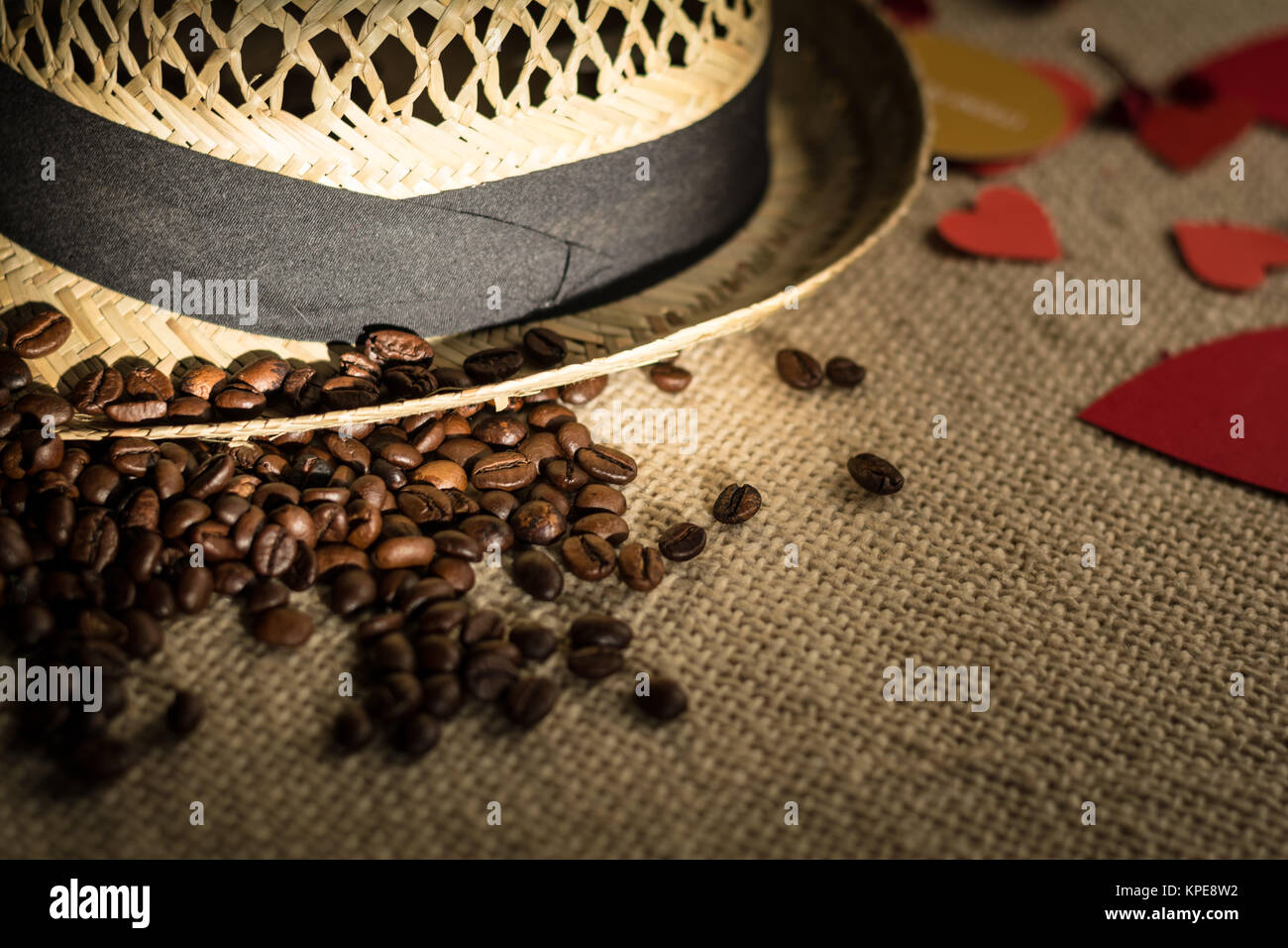 Hat with tape and freshly roasted coffee beans Stock Photo Alamy