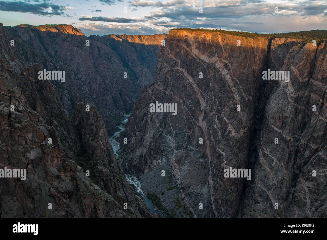 Sunrise on Painted Cliff in Black Canyon of the Gunnison National Park, Colorado Stock Photo