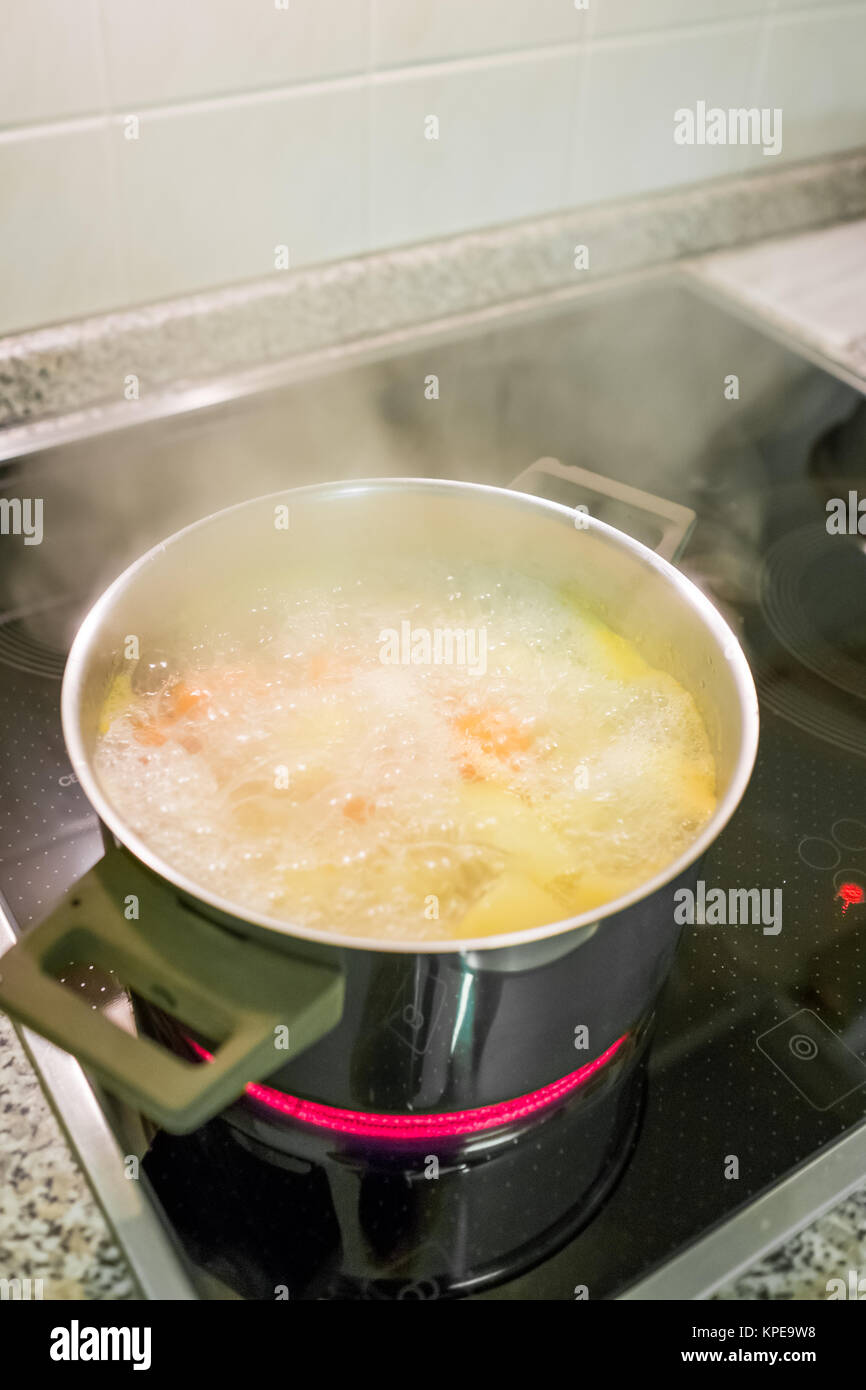 boiling water in a saucepan Stock Photo Alamy