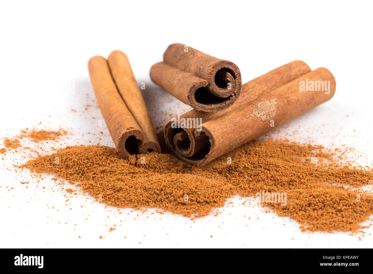 cinnamon sticks with powder Stock Photo Alamy